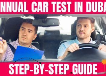 Driver preparing documents and car for the Annual Car Test In Dubai at an RTA inspection center.