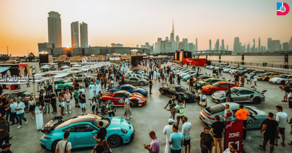 Vintage and modern Porsche cars displayed at the Icons of Porsche event in Dubai Design District