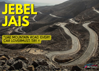 Car driving on Jebel Jais mountain road in Ras Al Khaimah, UAE