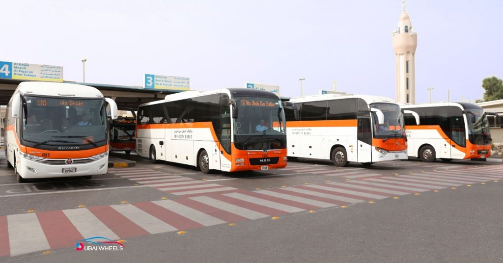 Al Jubail Bus Station Sharjah showing multiple buses, commuters, and efficient intercity connections