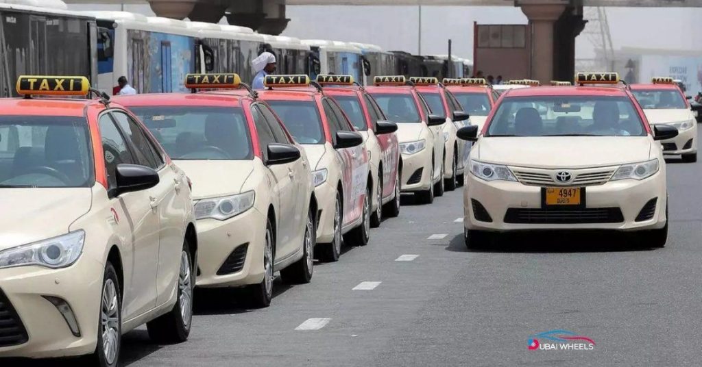 Dubai taxi interior showcasing RTA safety measures in 2025 including in-car cameras, GPS monitoring, emergency buttons, defensive driving, and clean vehicle standards