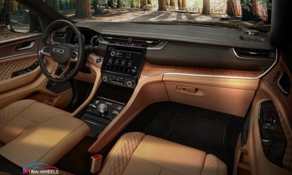 2025 Jeep Grand Cherokee UAE interior showing luxury leather seats, digital dashboard, ambient lighting, and advanced infotainment system