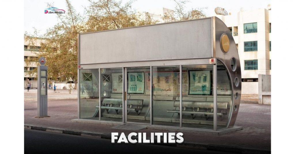 Facilities at Musaffah Bus Station in Abu Dhabi including seating, ticket counters, washrooms, clear signboards, taxi zone, and nearby cafes