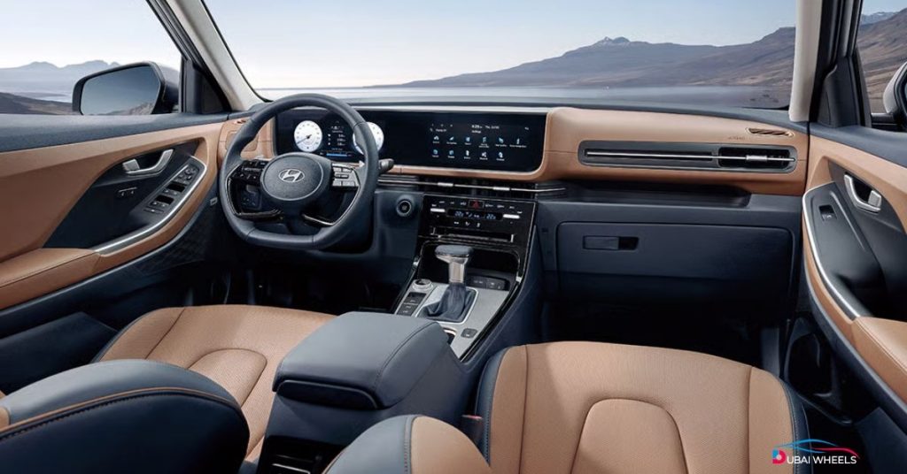Hyundai Creta 2025 UAE front interior showing driver and passenger seats, dashboard, steering, and infotainment system