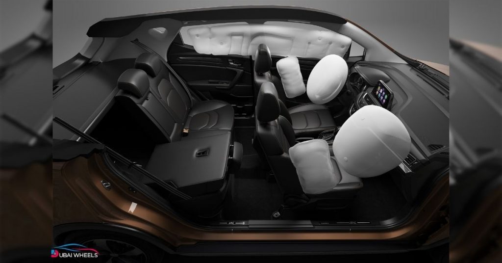 2025 JAC S3 UAE technology and safety features including touchscreen infotainment, Apple CarPlay, reverse camera, ABS, stability control, and multiple airbags