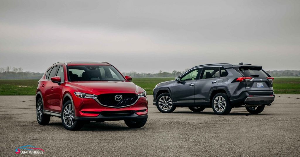 Mazda CX-5 vs Toyota RAV4 UAE real-world driving performance comparison 2025, showing highway stability, city comfort and handling differences for Dubai and Abu Dhabi roads
