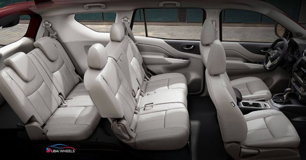 2025 Nissan Xterra UAE interior showing seven-seat layout, premium materials, and infotainment system
