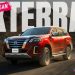 2025 Nissan Xterra UAE 4x4 SUV driving on desert dunes and rocky terrain