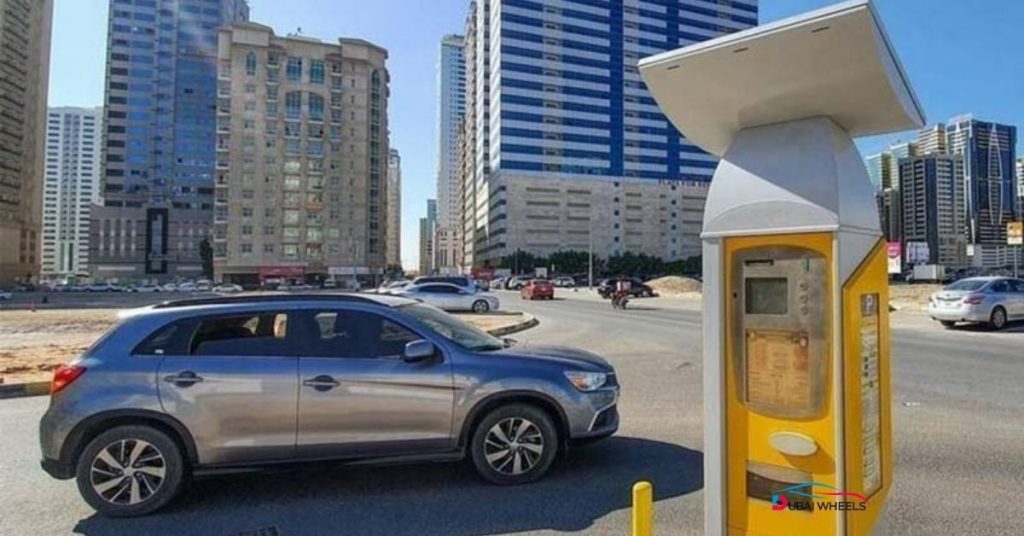 Sharjah parking regulations 2025: No yellow/black curb parking, no obstruction of driveways, no double parking, use SMS parking correctly