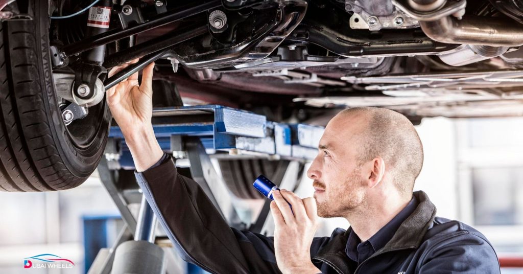 Complete vehicle inspection before a UAE road trip, checking engine oil, radiator, brakes, tires, battery, and lights for safe desert and highway driving.