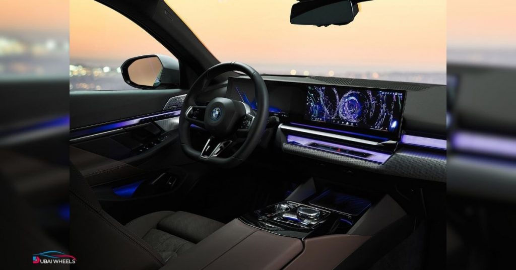 BMW 5 Series interior UAE showing driver-focused cockpit, luxury materials, and advanced technology