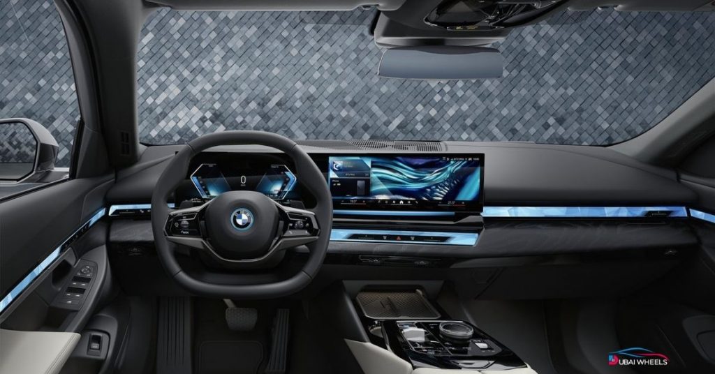 BMW 5 Series interior UAE showcasing driver-focused cockpit, premium seats, and advanced infotainment system