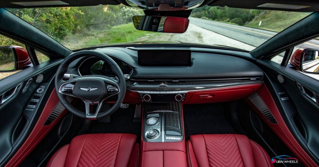 Genesis G80 interior UAE showcasing luxurious cabin, comfortable seating, and advanced technology features