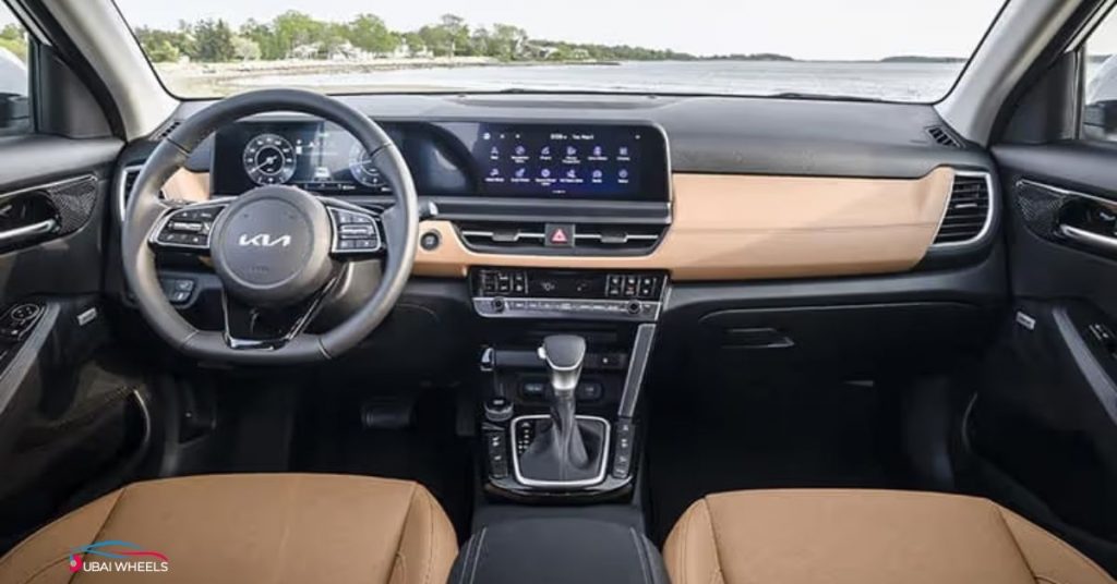 Kia Seltos interior UAE showing premium dashboard, dual screens, and modern cabin design