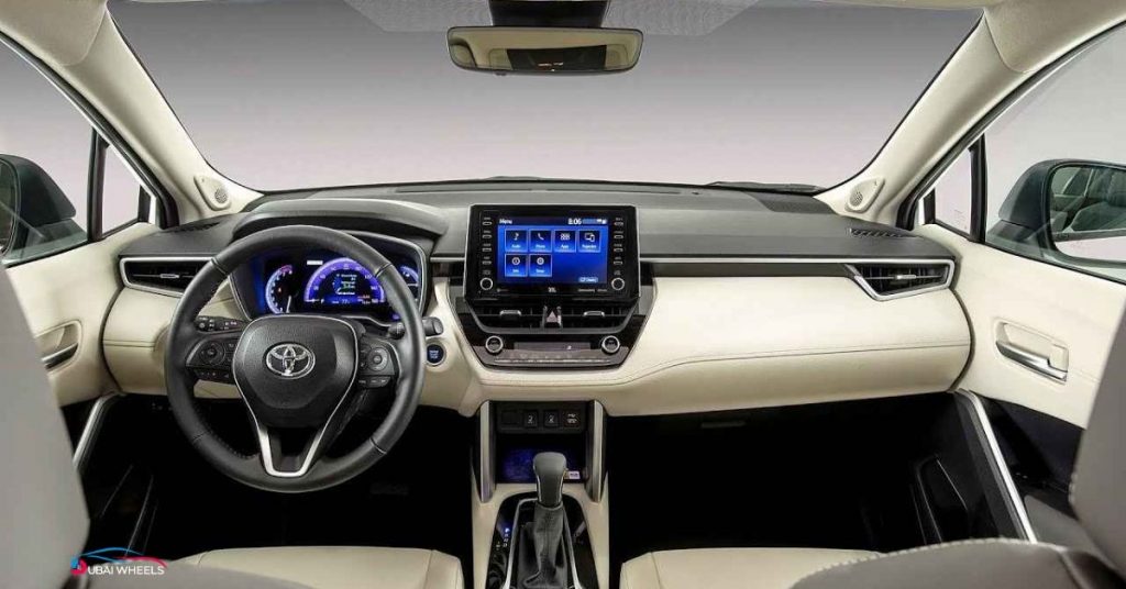 Nissan Sunny interior in UAE showing spacious cabin, rear legroom, and comfortable seating, ideal for families and daily city driving in Dubai and Abu Dhabi.