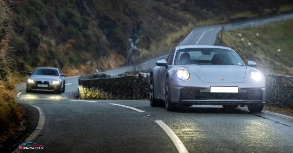 Porsche 911 vs BMW M4 UAE 2026 performance and acceleration comparison on Dubai roads