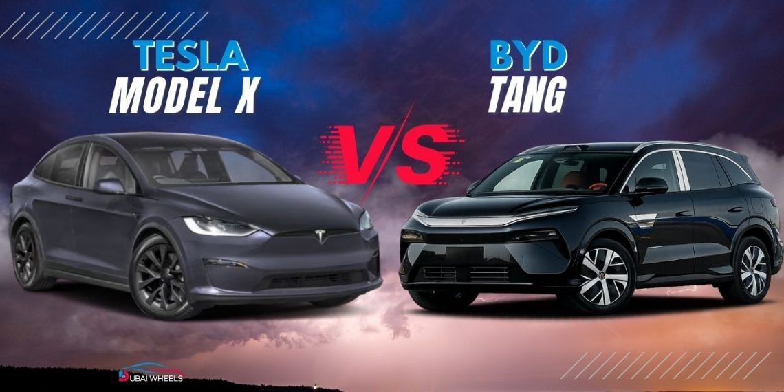 Tesla Model X vs BYD Tang UAE 7-seater luxury electric SUVs parked side by side on a Dubai road