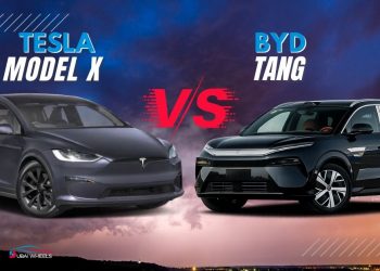 Tesla Model X vs BYD Tang UAE 7-seater luxury electric SUVs parked side by side on a Dubai road