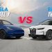 Tesla Model Y vs BMW iX UAE 2026 electric SUV comparison