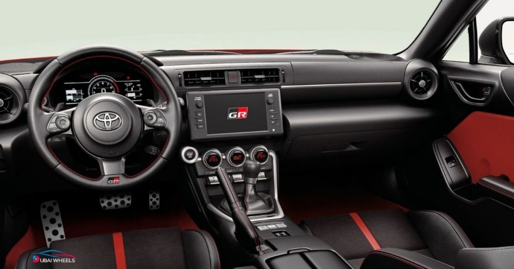 Toyota GR86 interior UAE showing driver-focused cockpit, sporty seats, infotainment system, and cabin design for city and highway driving
