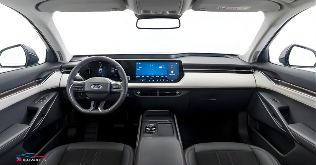Ford Taurus interior UAE featuring premium dashboard, digital display and spacious cabin in Ford Taurus vs Nissan Altima UAE comparison