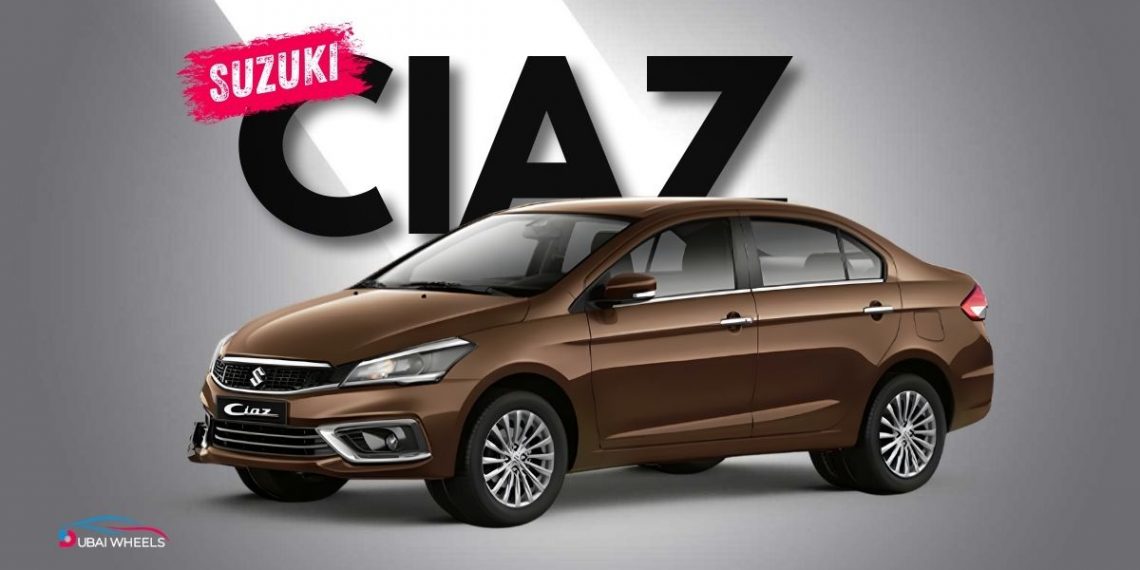 Suzuki Ciaz UAE front exterior view in silver color parked on Dubai road