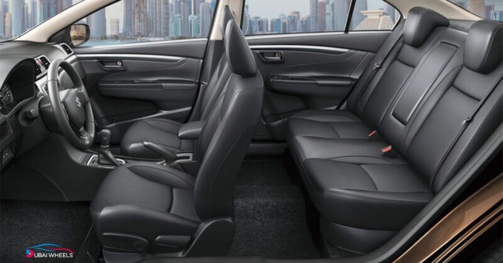 Suzuki Ciaz UAE interior showing dashboard, seats, and spacious cabin design