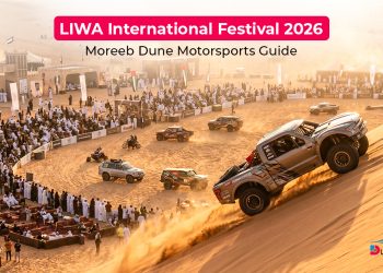 Modified off-road vehicles racing up Moreeb Dune during Liwa International Festival 2026 in Abu Dhabi desert