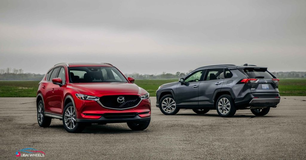 Mazda CX-5 vs Toyota RAV4 UAE real-world driving performance comparison 2025, showing highway stability, city comfort and handling differences for Dubai and Abu Dhabi roads