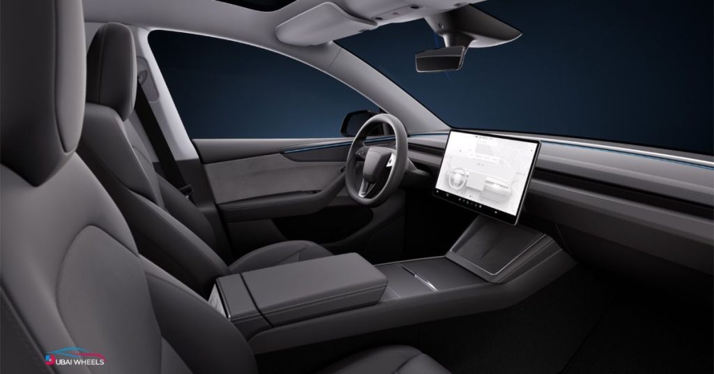 Tesla Model Y interior UAE showing minimalist dashboard, 15-inch touchscreen, and premium electric SUV cabin design