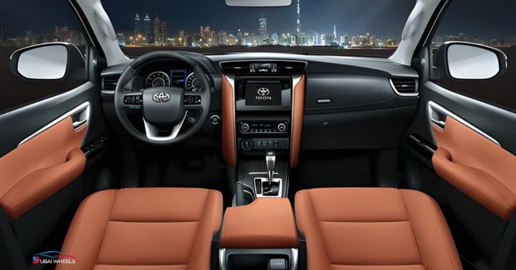 Toyota Fortuner UAE interior showing spacious cabin, ergonomic seats, and family-friendly design