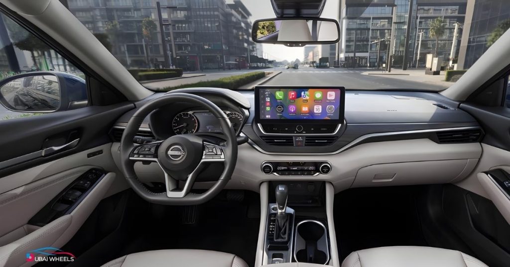 Nissan Altima interior UAE showcasing dashboard design, infotainment system and premium cabin features in Ford Taurus vs Nissan Altima UAE comparison